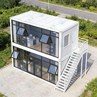 Maison conteneur minimaliste FLKT, structure noire, préfabriquée, modulaire, luxe, villa en conteneur maritime