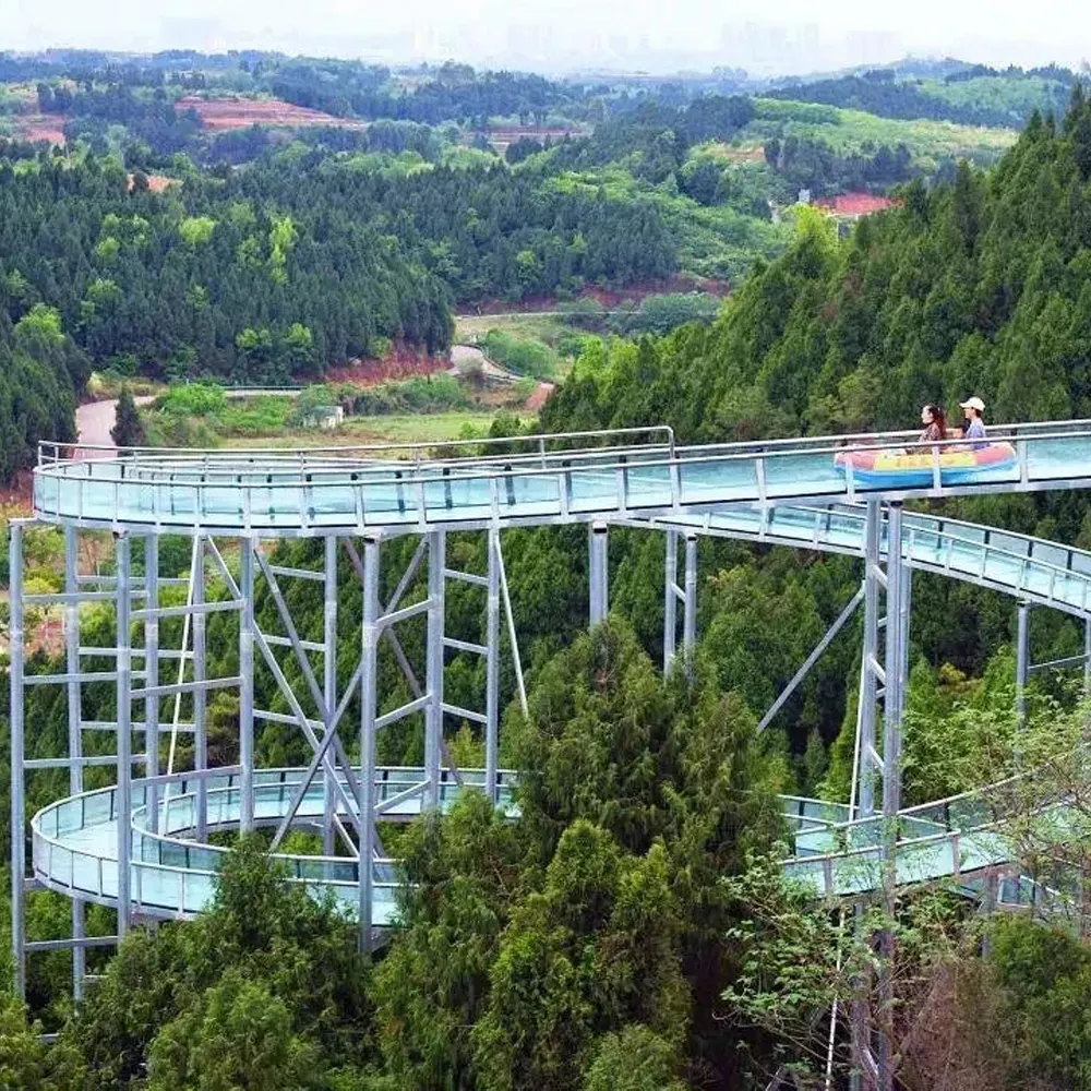 Tobogán de agua de cristal largo para exteriores, parque de atracciones de área escénica comercial personalizada, grande