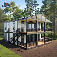 Maison conteneur pliable à double aile de 40 pieds, prête à l'emploi, cabine préfabriquée, chambre à coucher extensible, villa conçue pour le panneau sandwich en acier