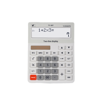 Calculatrice de bureau avec affichage à double ligne et rapport vocal est équipé de deux piles 3A.