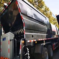 Camión de reparación de baches de asfalto de 12000 litros Sino Howo con componente de núcleo de motor de alta calidad
