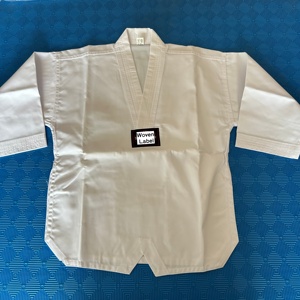 Uniforme <span class=keywords><strong>de</strong></span> Taekwondo <span class=keywords><strong>de</strong></span> Grado Competitivo, Tela Acanalada, Dobok, Bordado Personalizado con Marca, Servicio OEM para Clubes <span class=keywords><strong>de</strong></span> <span class=keywords><strong>Artes</strong></span> <span class=keywords><strong>Marciales</strong></span> - Product Image 6