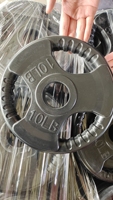 Plaque d'haltérophilie ronde durable, bon marché, 10lb, 45lb, en fonte et recouverte de caoutchouc, pour salle de sport, vente commerciale