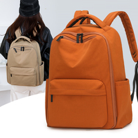 Sac à dos décontracté léger avec fermeture éclair, grande capacité, imperméable, respirant, minimaliste, avec pompon, pour le quotidien, les voyages et la randonnée