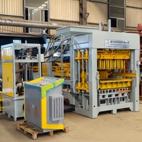 Machine de production automatique de briques en ciment QT8-15 avec système de contrôle PLC