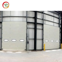 Porte sectionnelle industrielle isolée en acier pour entrepôt, avec bord de sécurité, moteur de secours UPS haute sécurité, étanche et télécommande