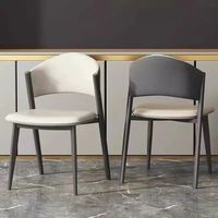 Ensemble de chaises de table de luxe modernes à dossier haut refroidissement en cuir nordique italien pour hôtel restaurant salle à manger en plein air Style design