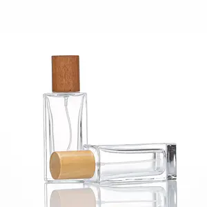 60ml lüks yuvarlak şeffaf cam parfüm ambalaj şişesi ince sis toz püskürtücü ahşap kapaklı