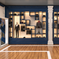 Magasin de vêtements de luxe vitrines meubles design personnalisé vêtements pour hommes armoires murales peinture bleue présentoirs muraux