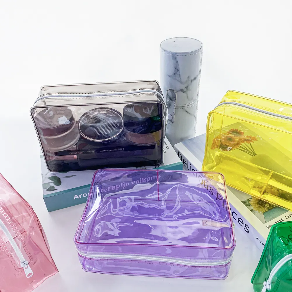 Bolsas de maquillaje impermeables transparentes con logotipo personalizado para mujer, artículos de tocador de viaje, bolsas de cosméticos de Pvc transparentes con cremallera, bolsa de maquillaje