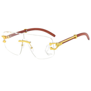 Gafas de Sol QSF sin Marco de una Pieza, UV400, Bordes Ondulados, Tinte Negro, Unisex, con Diadema con Estampado de Leopardo - Product Image 3