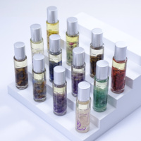 Huiles essentielles en roll-on cristallines à vendre, fabrication OEM, étiquette personnalisée, huile essentielle en roll-on pour la peau, huile de massage corporel, parfum avec pierre précieuse