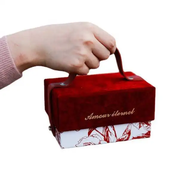 卸売カスタムロゴレッドシャンパンベルトベルベットブロンズスクエアフラップキャンディーフラワー化粧品香水ポータブルトートギフトボックス