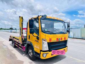 Used HOWO 4x2 <b>Flatbed</b> Tow <b>Truck</b> Diesel Manual Road Recovery Wrecker Rescue Vehicle From China for Car Towing - Product Image 1
