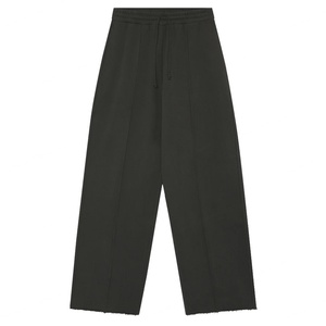 Pantalon de survêtement large et épais en molleton de coton brossé, avec ourlets bruts, coutures plissées et entrejambe abattu, coupe ample - Product Image 1