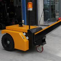 Tracteur de remorquage électrique compact, capacité de traction nominale de 3500 kg, chargeur 24 V 15 A, conçu pour la manutention de matériaux en atelier