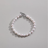 Bracelet à fermoir avec breloque en perle d'eau douce - Design classique et tendance