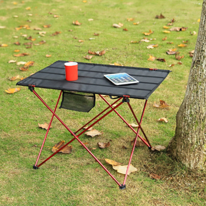 <span class=keywords><strong>Table</strong></span> <span class=keywords><strong>de</strong></span> camping pliable d'extérieur compacte avec sac <span class=keywords><strong>de</strong></span> transport, cadre métallique rouge, idéale pour les pique-niques, les barbecues, les festivals et la randonnée - Product Image 1