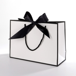 Venta al por mayor negro Tarjeta impresa logotipo bolso embalaje perfume paquetes de regalo entrega puntual cajas de papel personalizadas para regalos de ropa - Product Image 4