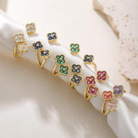 Élégant et luxueux, en cuivre incrusté de zircon coloré, trèfle à quatre feuilles porte-bonheur, pétale de fleur exquis super brillant, cadeau de mariage ouvert