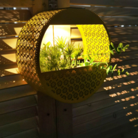 Lanterne solaire décorative d'extérieur en métal creux en forme de cercle jaune