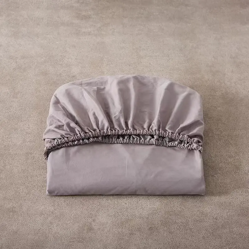 Set di biancheria da letto traspirante Low MOQ personalizzato tinta unita in cotone lenzuola da letto con lenzuola piatte a due lenzuola