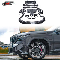 Kit de conversion de voiture style M en fibre de carbone sèche pour BMW XM G09 2022+ : Lame avant, diffuseur arrière, extensions d'ailes et ailerons