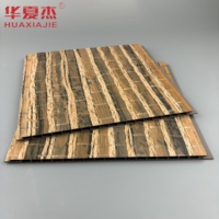 Vente en gros de panneaux muraux en PVC avec un motif classique en bambou imperméable et ignifuge pour la décoration de restaurant