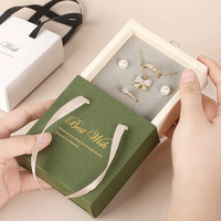 Boîte de rangement portable en papier pour bijoux et montres, avec logo estampé à chaud, paillettes, fermeture magnétique et emballage en forme d'avion