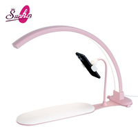 Lampe à ongles demi-lune de luxe abordable avec repose-main doux et support de téléphone flexible pour salon de manucure