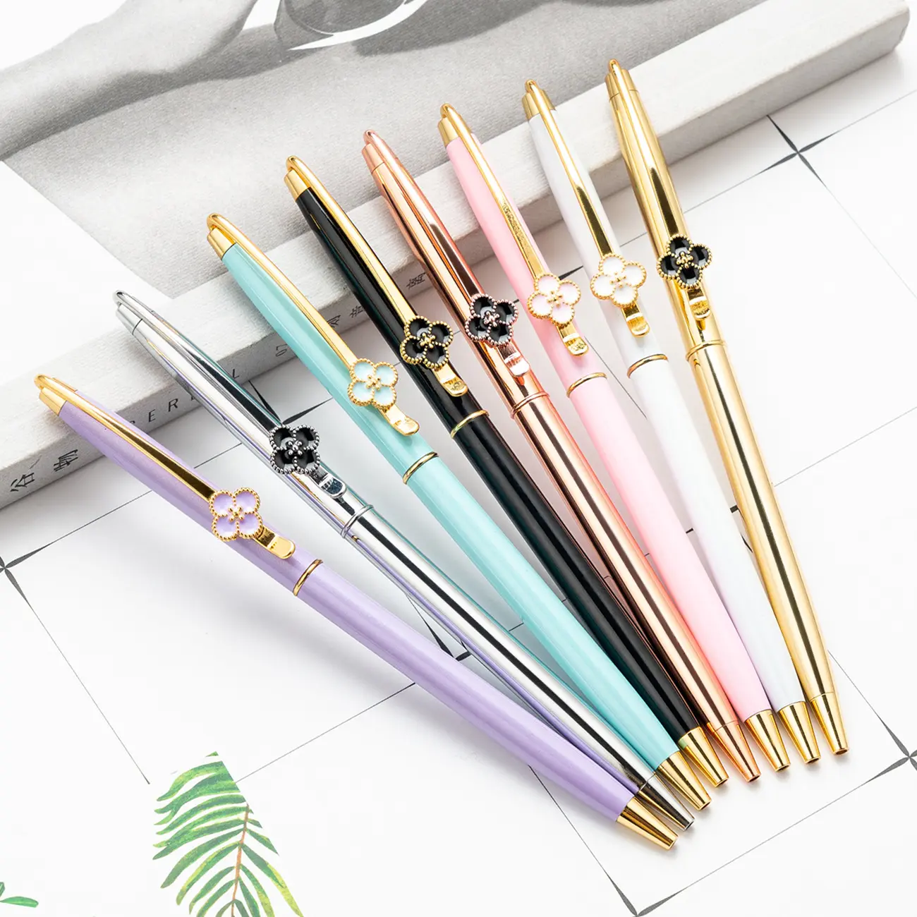 Novelty gift clover ballpoint pens custom LOGO slim rose gold metal ball pen with flower on clip
