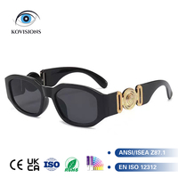 Lunettes de soleil hexagonales noires audacieuses pour hommes et femmes, avec médaillon doré épais, protection UV400, monture épaisse, style affirmé, vente en gros OEM