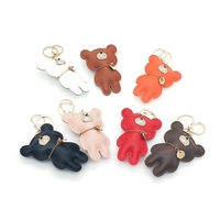Porte-clés de luxe en cuir PU marron, petit porte-clés Bling, ours, avec pompon, vente en gros