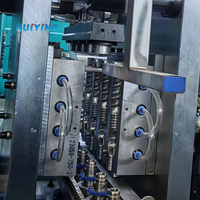 Ligne de production de bouteilles PET de 2 L entièrement automatique à 4 cavités, machine de soufflage de bouteilles extensibles pour la fabrication de bouteilles d'eau