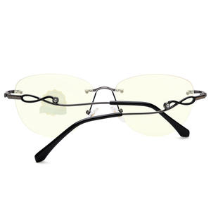 Nuevo estilo de gafas sin montura con filtro de luz azul para mujer, montura ovalada 50002, gafas protectoras con adornos de diamantes de imitación - Product Image 4