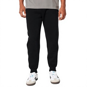 Pantalon de survêtement noir tricoté pour homme, taille élastique avec cordon de serrage, poches latérales, poids moyen, 100 % coton, décontracté, pour l'automne - Product Image 1