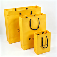 Sacs cadeaux en papier jaune de luxe pour bijoux, bracelets, boucles d'oreilles, colliers, bagues, emballages de grande capacité, personnalisables
