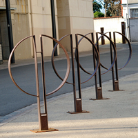 Support de vélo circulaire vertical à poser au sol, en métal, pour l'espace public urbain