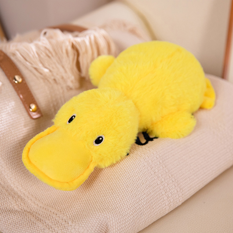 Peluche canard couché pour animaux de compagnie avec son couinant.