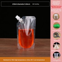 Vente en gros plastique transparent jetable boisson Whisky lait thé café boisson jus eau liquide pochette de voyage portable à bec verseur