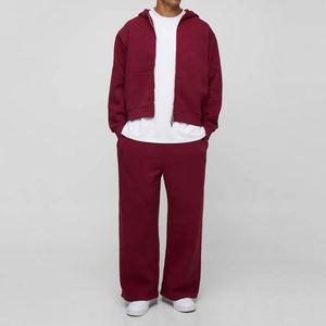 Ensemble de survêtement deux pièces pour homme personnalisé, comprenant un sweat à capuche court zippé rouge bordeaux et un pantalon de survêtement large drapé aux tons terreux riches - Product Image 1