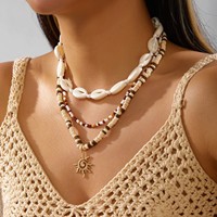 Collier de perles en coquille de noix de coco style vacances à la plage, pendentif soleil haut de gamme de luxe léger, accessoire de bijouterie transfrontalier