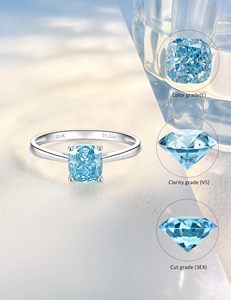 แหวนเพชรทรงคุชชั่นคัทอะความารีนแบบสั่งทำจากโรงงาน SGARIT แหวนทองคำขาว 14K แบบสี่ก้านแหวก ดีไซน์เรียบหรู สำหรับเป็นแหวนหมั้นหรือแหวนแทนใจ - Product Image 4