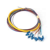 Puente de fibra óptica monomodo de red 3G del fabricante, paquete de 12 núcleos 0,9 con equipo de fibra óptica Pigtail de 12 colores usado