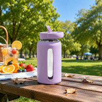 Gobelet en verre portable de 600 ml avec couvercle en silicone anti-brûlure et paille réutilisable pour jus, usage quotidien à la maison et en extérieur, cadeau d'affaires - Vente en gros