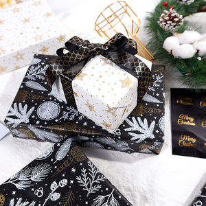 Papel de regalo en relieve personalizado de fábrica 43*300 cm embalaje de papel de regalo de Navidad - Product Image 4