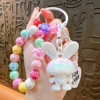 Nouveau dessin animé acrylique lapin perlé bracelet femme pendentif créatif couple voiture sac porte-clés cadeaux en gros