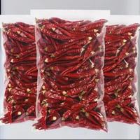 Bumbu Makanan Cabai Merah Kering Utuh Sedikit Pedas Pasokan Grosir Kemasan 25kg Sichuan Cina Dikeringkan dengan Sinar Matahari