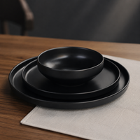 Service de table en porcelaine céramique de qualité supérieure de 12 pièces avec glaçure noire semi-mate avec bol de riz aux fruits et assiette à pâtes incurvée
