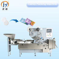 Machine d'emballage horizontale à sachets coussin pour bonbons solides à haute efficacité avec trois servomoteurs